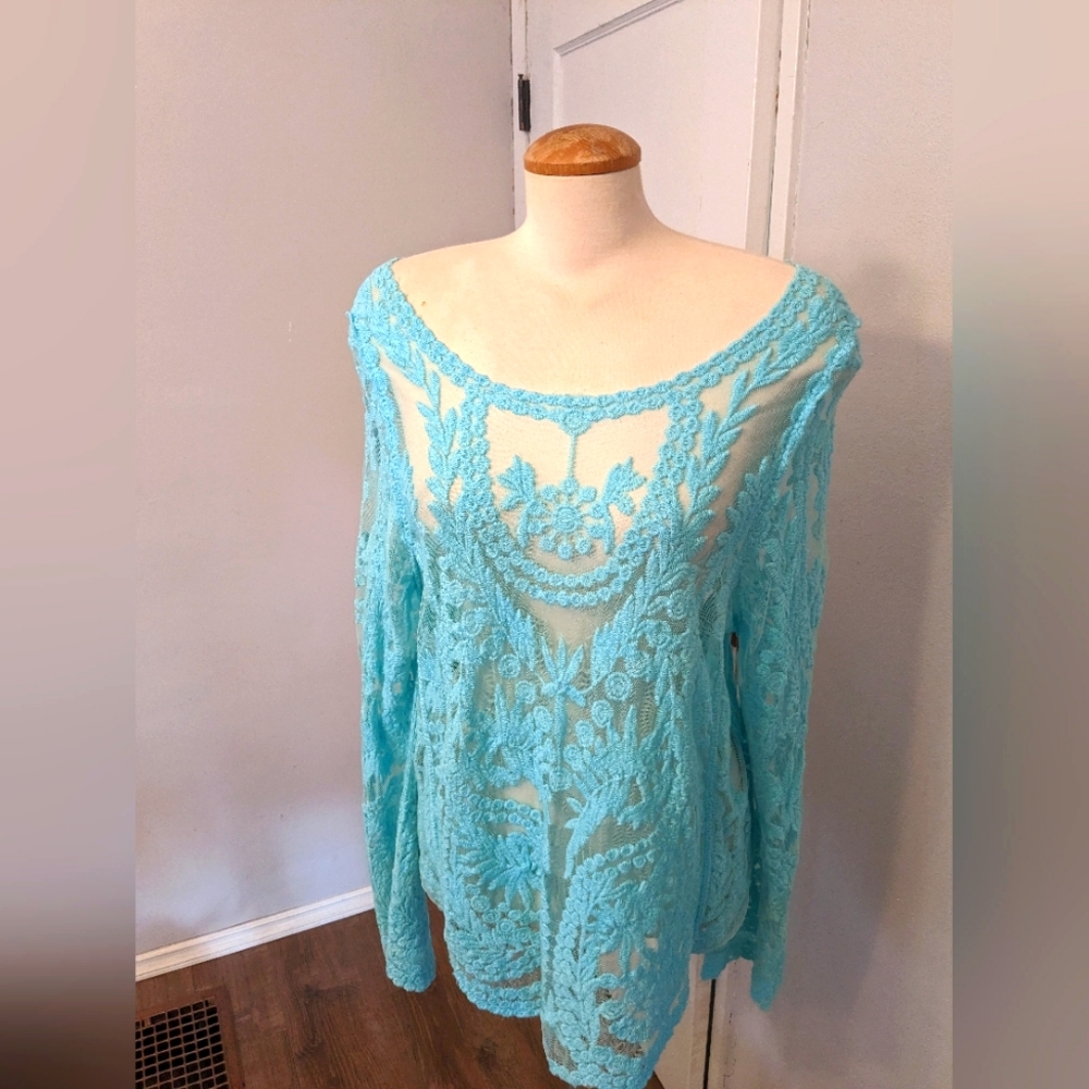 Beautiful lace blouse / bathing suit coverup.